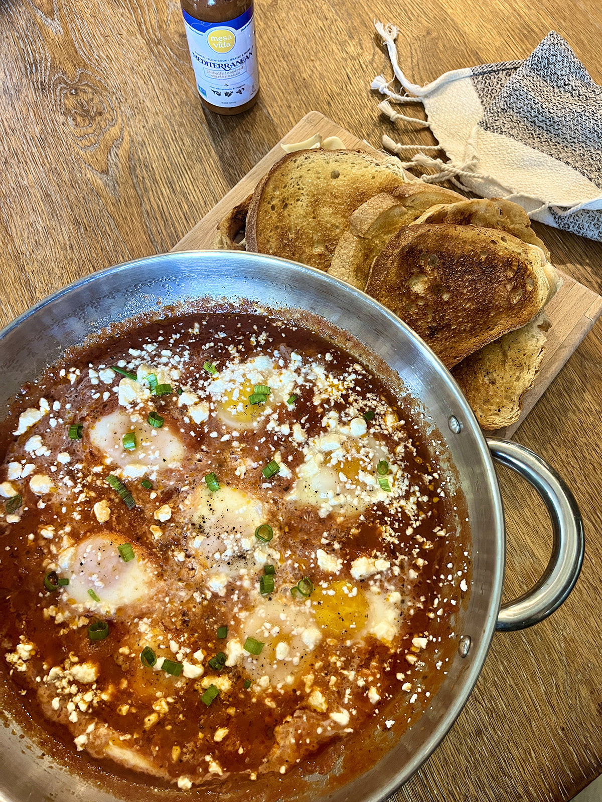 shakshuka recipe, eggs in a savory tomato sauce